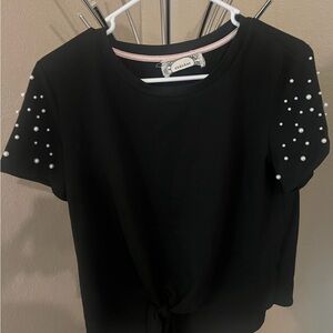 Elegant Black Top with Pearl Sleeves